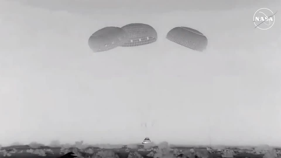 This screengrab taken from a video shows Boeing Starliner as it touches down in White Sands Space Harbor, New Mexico, at 12:01 a.m. ET on September 7. - NASA