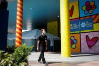 Dennis D'Urso, a resident ER doctor at Jackson Memorial Hospital, arrives at work for the start of his shift amid an outbreak of the coronavirus disease (COVID-19), in Miami