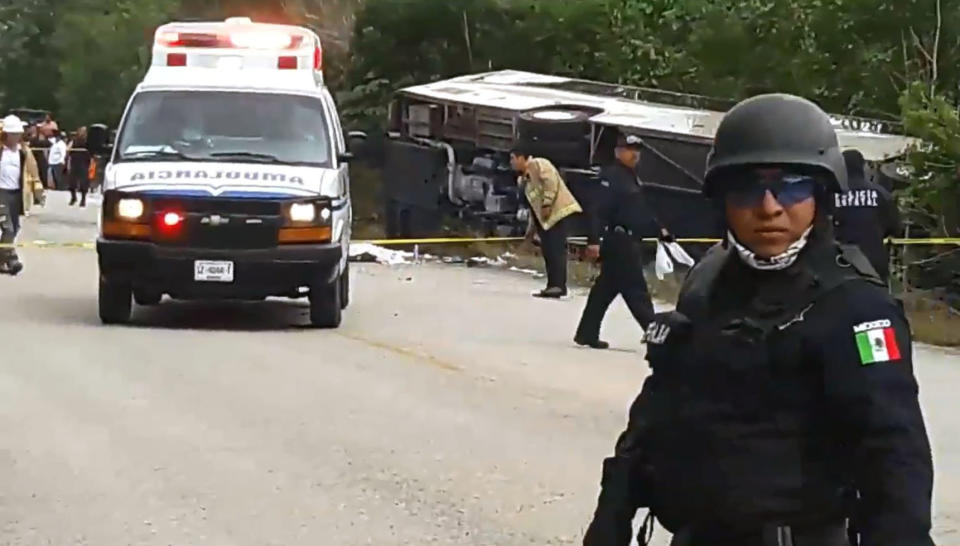 A bus transporting tourists to the Chacchoben Ruins in southeast Mexico lost control and overturned Tuesday, killing and injuring multiple people. (Photo: MANUEL JESUS ORTEGA CANCHE via Getty Images)