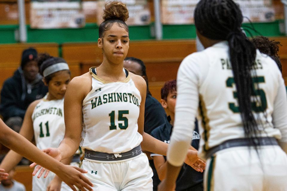 Washington's Mila Reynolds (15) is announced as a starter before the Washington vs. Crown Point girls basketball all game Tuesday, Jan. 25, 2022 at Washington High School.