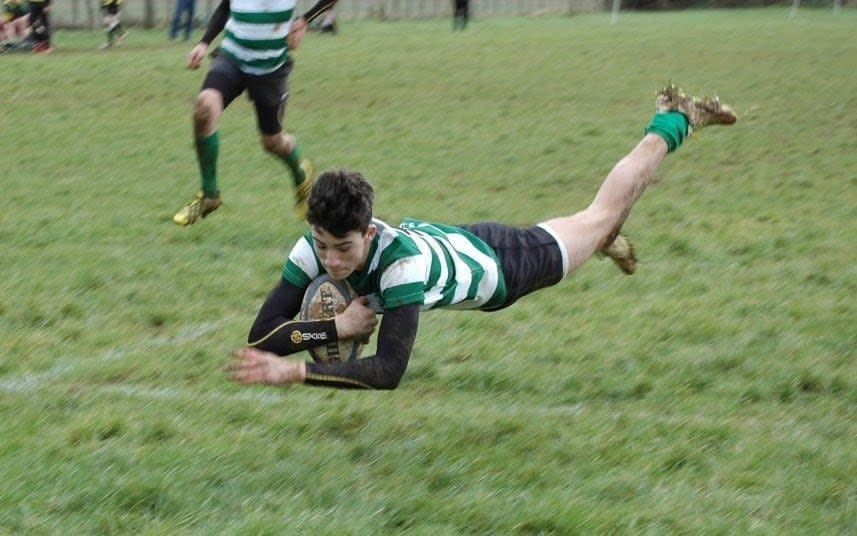 Orlando Bailey scoring a try for Dorchester U13s - DORCHESTER RFC