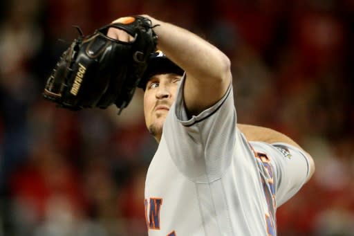 Houston's Will Harris pitches in the Astros 4-1 win over the Washington Nationals in game three of Major League Baseball's World Series