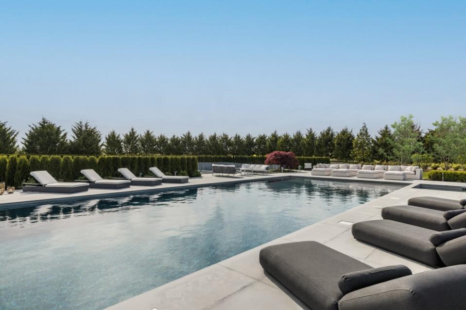 The Hamptons estate features a resort-style saltwater pool. Hedgerow Exclusive Properties