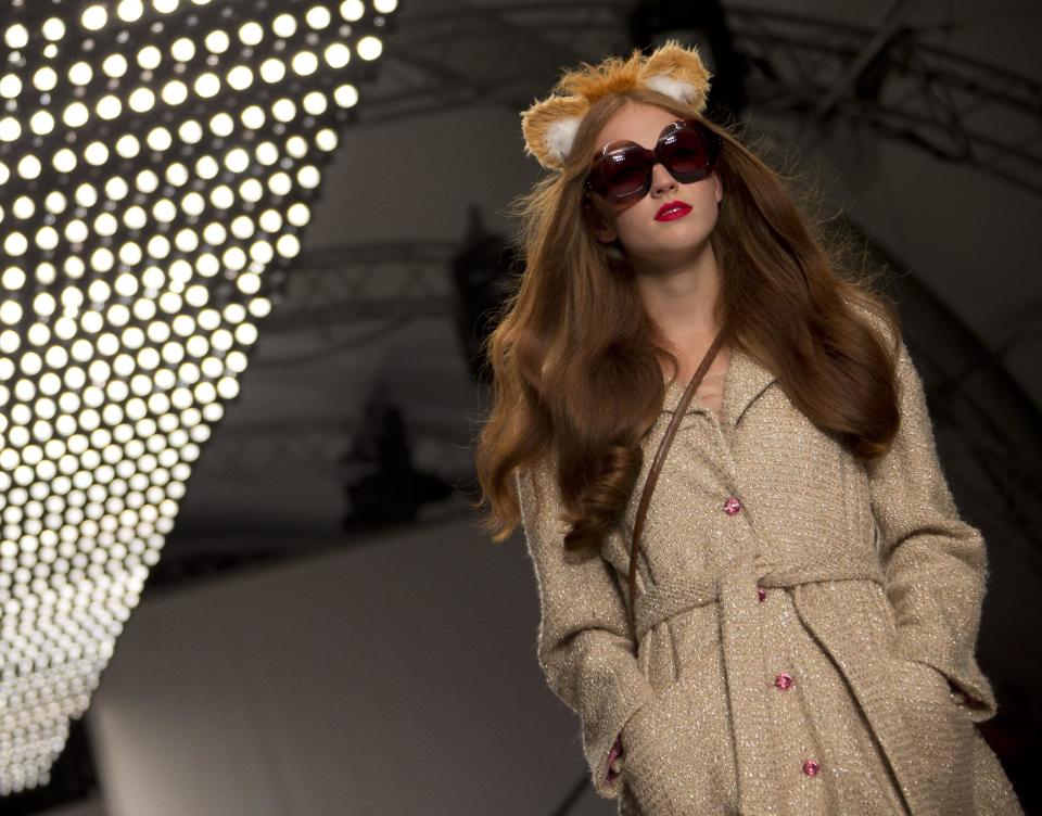 A model wears a design created by Ryan Lo of Fashion East during London Fashion Week Spring/Summer 2014, in Regent's Park, central London, Tuesday, Sept. 17, 2013. (Photo by Joel Ryan/Invision/AP)