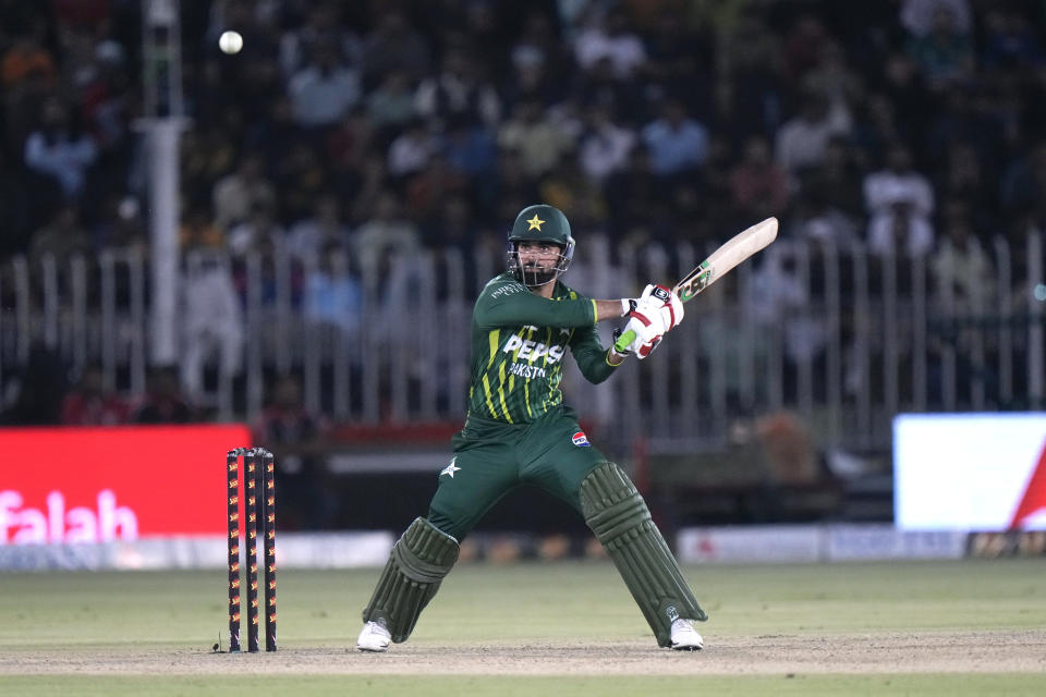 Pakistan's Shadab Khan plays a shot during the third T20 international cricket match between Pakistan and New Zealand, in Rawalpindi, Pakistan, Sunday, April 21, 2024. (AP Photo/Anjum Naveed)