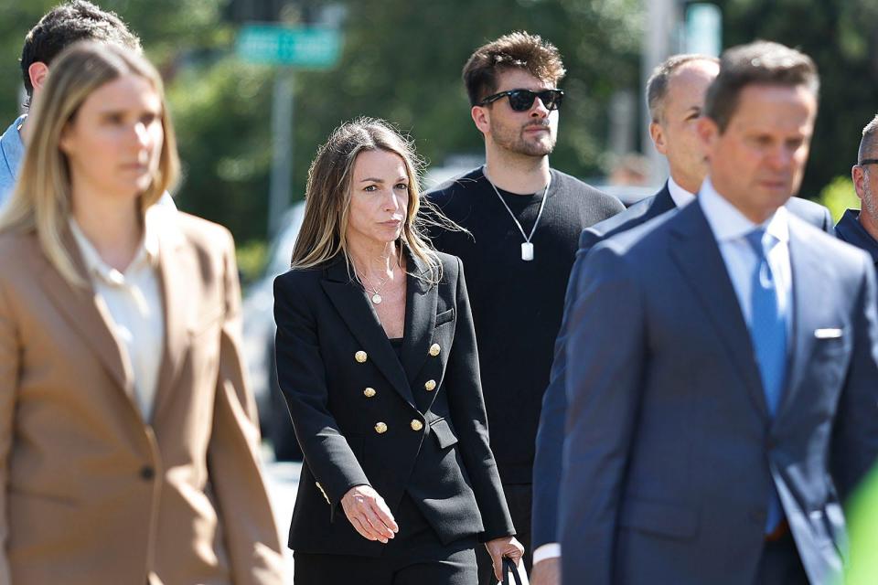 Karen Read surrounded by lawyers and security leave the courthouse without a verdict. Read and her supporters wait for a verdict in her murder trial on day three of deliberations at Norfolk Superior Court in Dedham on Thursday June 27, 2024