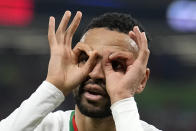 Morocco's Youssef En-Nesyri celebrates after he scored his side's second goal during the World Cup group F soccer match between Canada and Morocco at the Al Thumama Stadium in Doha , Qatar, Thursday, Dec. 1, 2022. (AP Photo/Natacha Pisarenko)