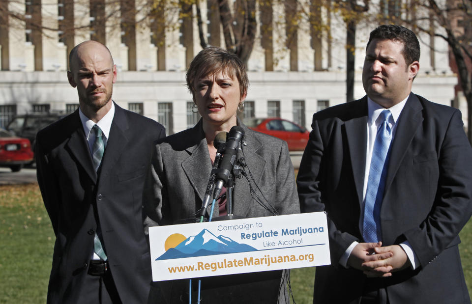 Betty Aldworth, center,  a director of the Yes on 64 campaign responds to questions about the legalization of marijuana at a news conference  at Civic Center Park in Denver on Wednesday, Nov. 7, 2012. Co-directors Brian Vicente, left, and Mason Tvert, right, listen. Colorado voters passed Amendment 64 on Tuesday legalizing marijuana in Colorado for recreational use. (AP Photo/Ed Andrieski)