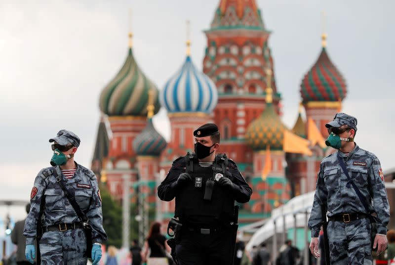 FILE PHOTO: Russian law enforcement officers work at the annual Red Square Book Fair in central Moscow