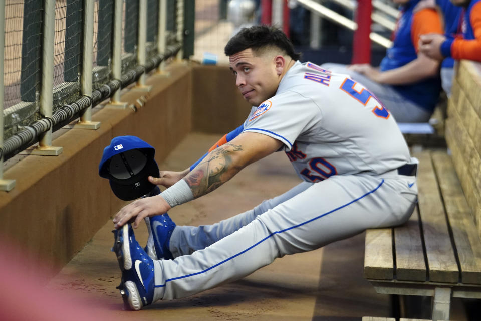 New York Mets' Francisco Álvarez stretches before the team's baseball game against the Atlanta Braves on Friday, Sept. 30, 2022, in Atlanta. (AP Photo/John Bazemore)