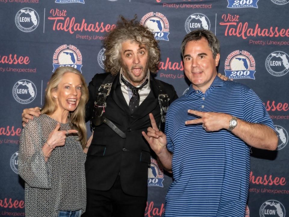 Blake and Jeanne pose with Wayne Coyne from the Flaming Lips, who played at Cascades Park as part of Word of South on April 26, 2024.