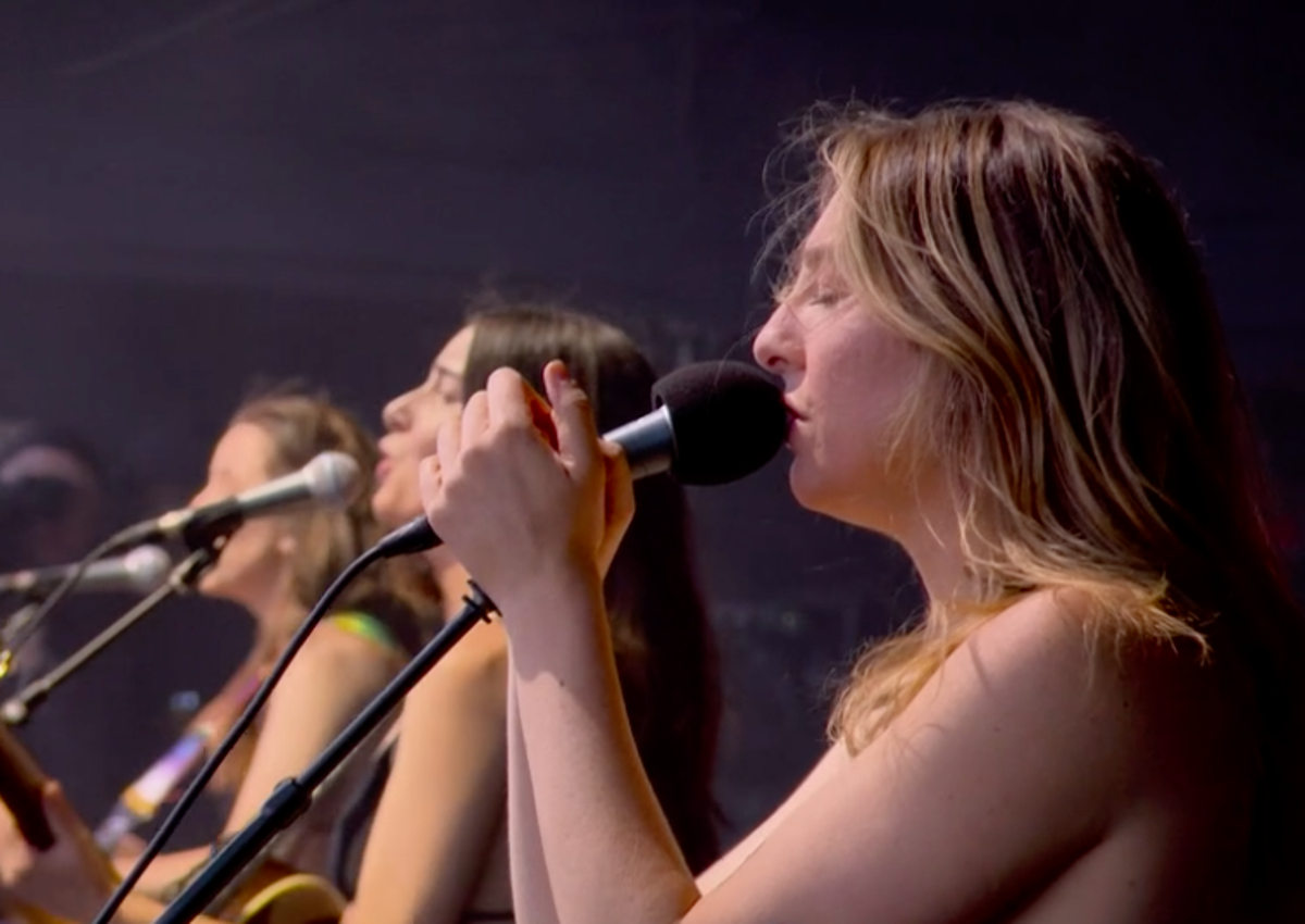 Haim performing on the Pyramid Stage (BBC)