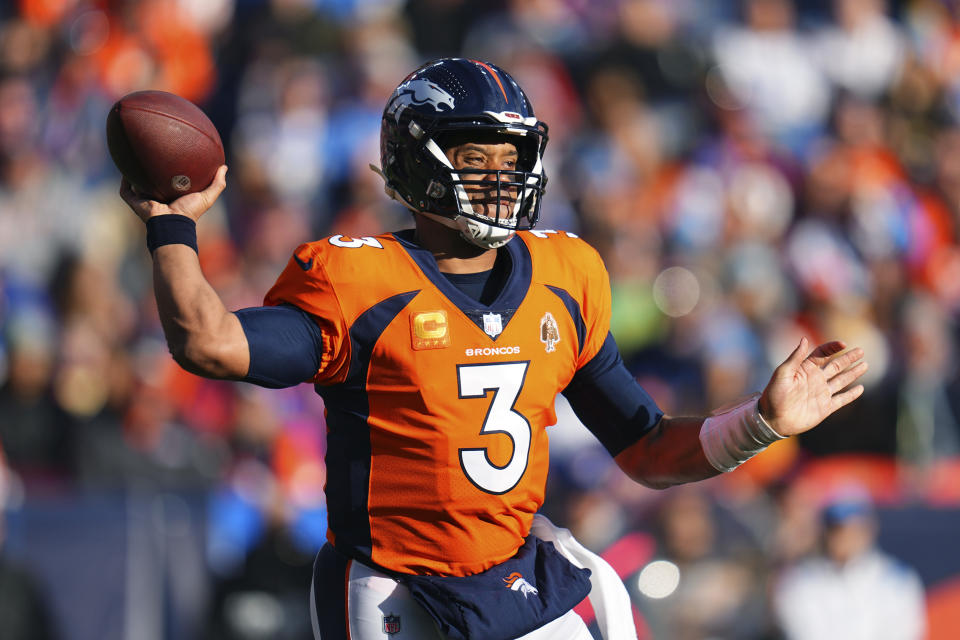 Denver Broncos quarterback Russell Wilson (3) looks to pass against the Los Angeles Chargers during the first half of an NFL football game in Denver, Sunday, Jan. 8, 2023. (AP Photo/Jack Dempsey)