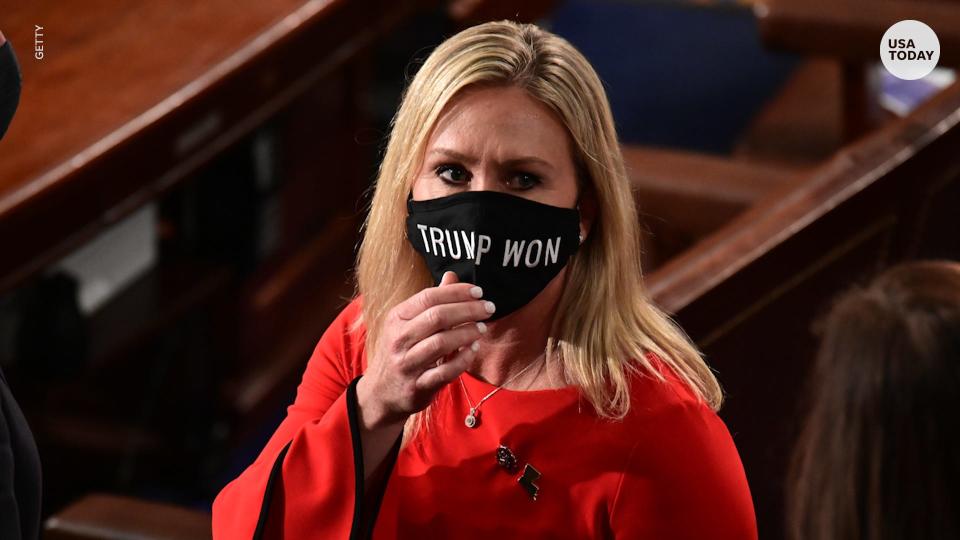 Rep. Marjorie Taylor Greene wears "Trump won" mask.