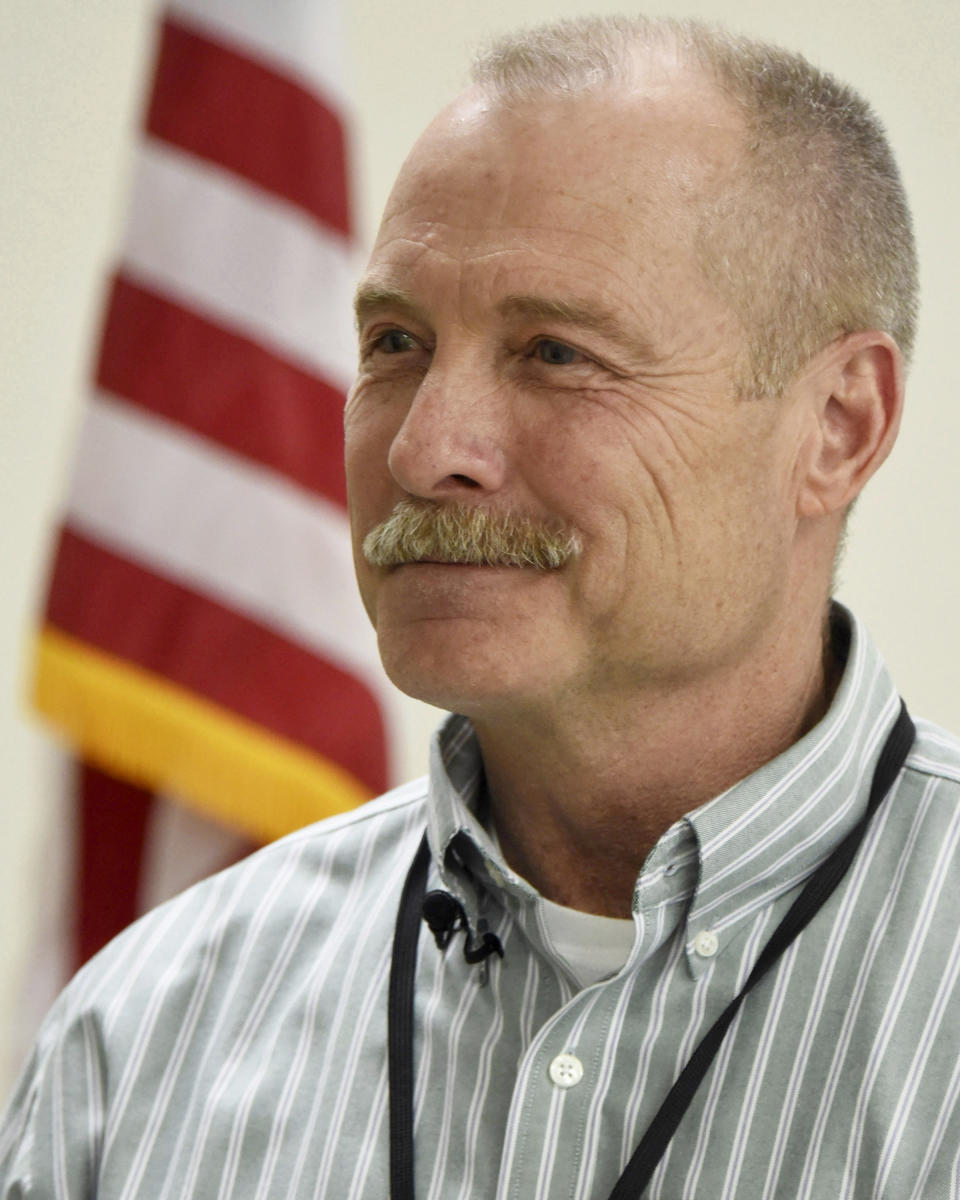 Grand Traverse County Sheriff Michael D. Shea attends a conference with local election and law enforcement officials Wednesday, April 10, 2024, in Traverse City, Mich. A top concern for local election workers throughout the country this year is their own safety. A group, formed after the 2020 presidential election, is traveling the country helping them prepare for what could lie ahead. Shea, a Republican who is on the ballot in the fall, said he was surprised at how vulnerable election officials can be because of the requirements associated with their job, but said he trusted experts and his local election officials.. (AP Photo/John L. Russell)