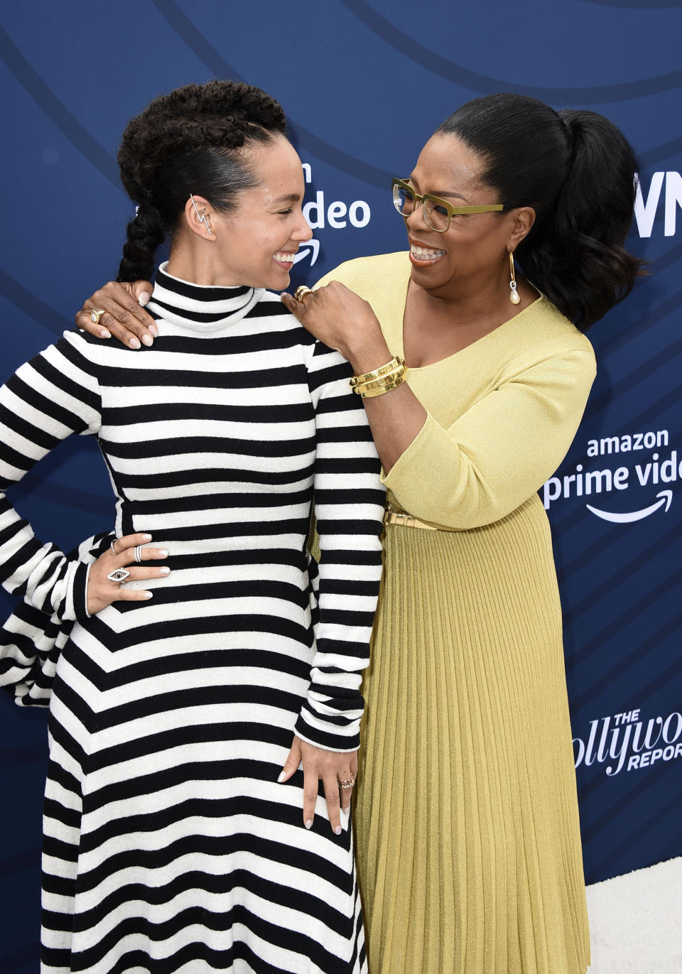 FILE - This April 30, 2019 file photo shows musician Alicia Keys, left, and Oprah Winfrey at The Hollywood Reporter's Empowerment in Entertainment Gala in Los Angeles. Keys' memoir "More Myself" will be released on Tuesday, March 31. (Photo by Jordan Strauss/Invision/AP, File)