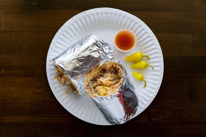 Los Angeles, CA - July 12: The Combination Burrito at Olympic Burger on Tuesday, July 12, 2022 in Los Angeles, CA. (Wesley Lapointe / Los Angeles Times)