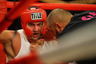 <p>Jimmy Trabulsy (red) sits in his corner in a fight John Macari (blue) in the 121st Precinct Grudge Match at the NYPD Boxing Championships at the Hulu Theater at Madison Square Garden on March 15, 2018. (Gordon Donovan/Yahoo News) </p>