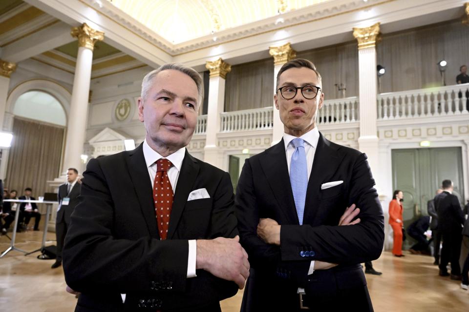 Leaders after the early vote results, National Coalition Party candidate Alexander Stubb, right, and Social Movement candidate Pekka Haavisto stand during the Presidential election event, at the Helsinki City Hall, in Helsinki, Finland, Sunday, Jan. 28, 2024. A projection in Finland says Alexander Stubb has won the first round of the presidential election to set up a Feb 11 runoff. ( (Markku Ulander/Lehtikuva via AP)