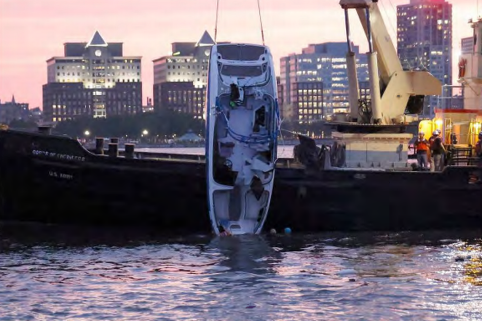 The boat being recovered from the Hudson River.