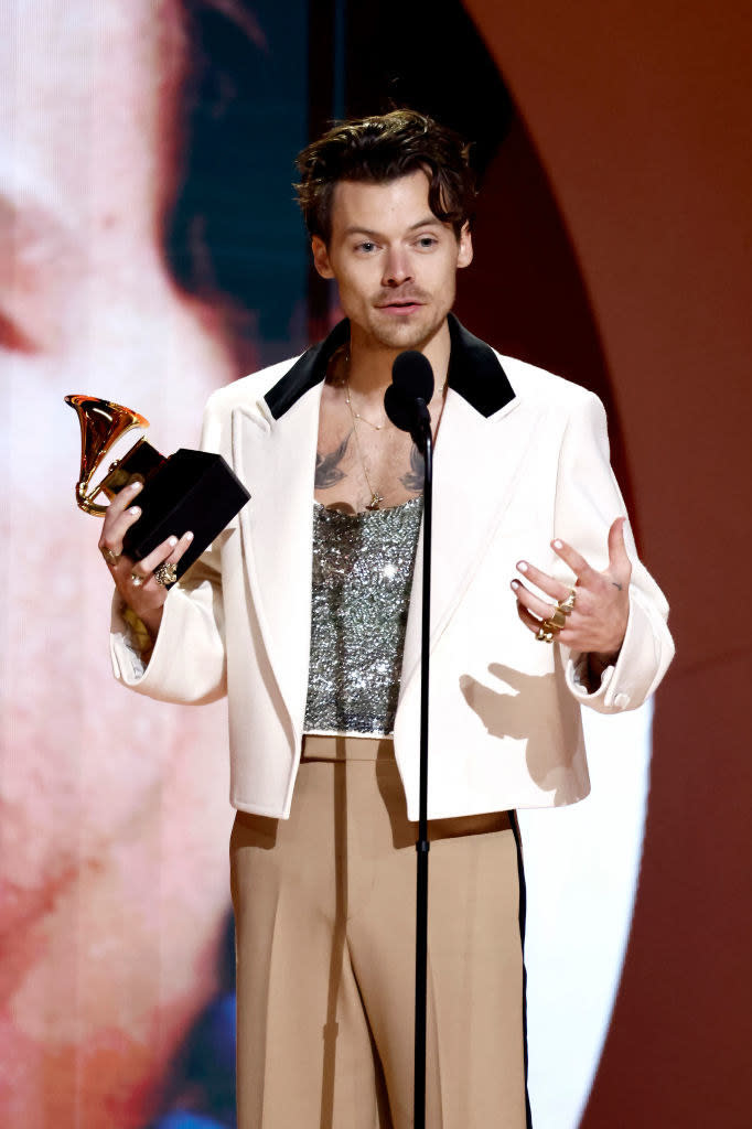 Harry accepts the award for best pop vocal album