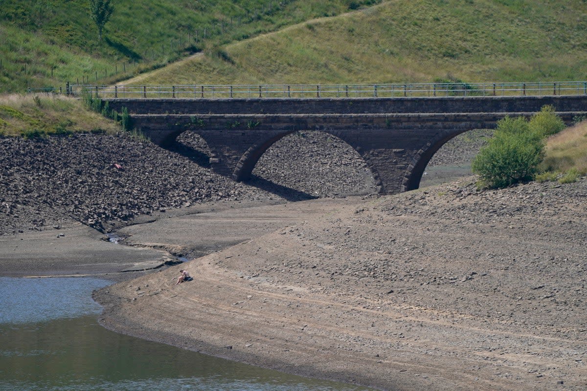 A near empty Dowry Reservoir close to Oldham. (PA)