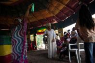 Members of a Rastafari farming community celebrate the Sabbath service, during COVID-19 pandmeic in Blue Mountains