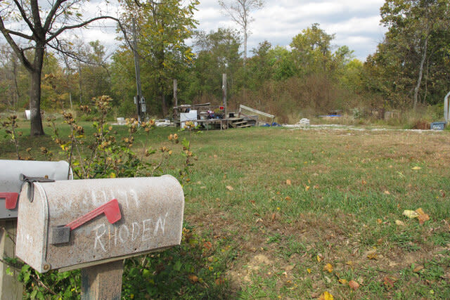 A porch is all that remains of the home on Union Hill Road after investigators removed the trailer