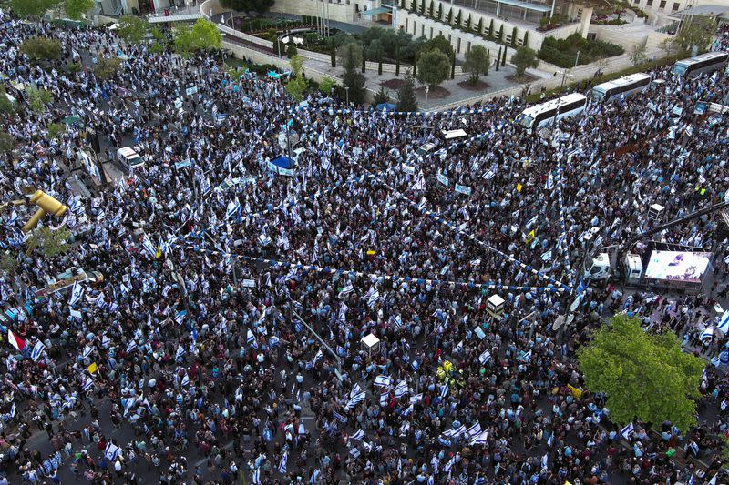 An aerial view shows right-wing demonstrators at a protest calling on the Israeli government to complete its planned judicial overhaul, in front of the Knesset, Israel's Parliament, in Jerusalem