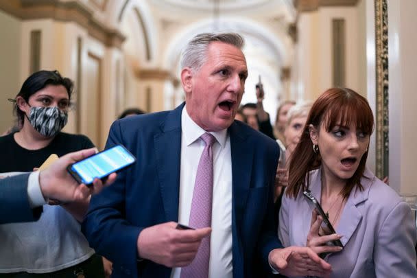 PHOTO: House Minority Leader Kevin McCarthy heads to his office surrounded by reporters at the Capitol in Washington, May 12, 2022. (J. Scott Applewhite/AP, FILE)