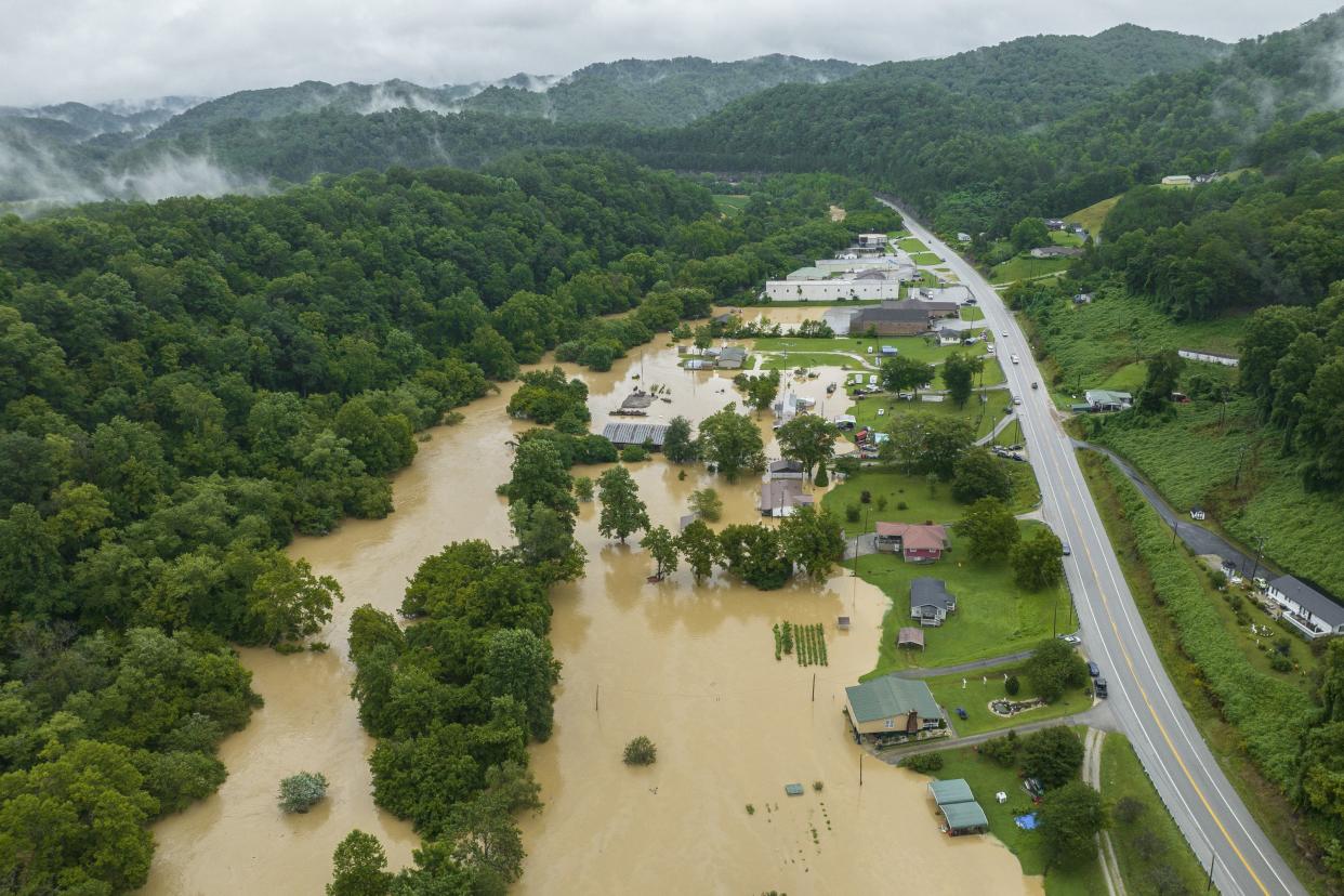 Homes and structures are flooded near Quicksand, Ky. on Thursday, July 28, 2022. The same stubborn weather system caused intense downpours in St. Louis and Appalachia that led to devastating and in some cases deadly flooding.