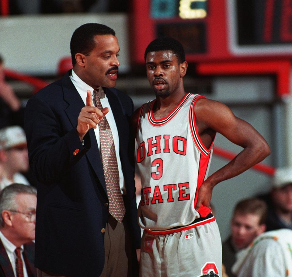 Ohio State coach Randy Ayers has a word with player Neshaun Coleman during a game against Illinois in 1996.
