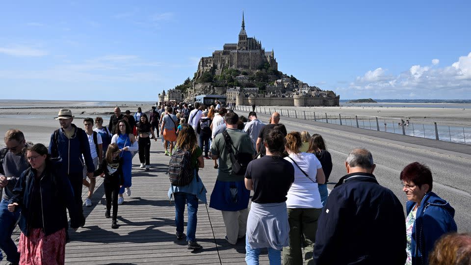 France's Mont St. Michel has been battling with tourist covercrowding. - Damien Meyer/AFP/Getty Images