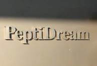 The logo of PeptiDream Inc, is seen at the company headquarters in Kawasaki, Japan