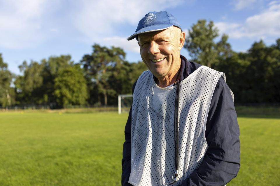 Makkabi Berlin coach Wolfgang Sandhowe poses for a photo before a practice match, in Berlin, Wednesday, July 26, 2023. When Makkabi Berlin takes the field on Sunday Aug. 13, 2023, the soccer club founded by Holocaust survivors will become the first Jewish team to play in the German Cup. (AP Photo/Ciaran Fahey)