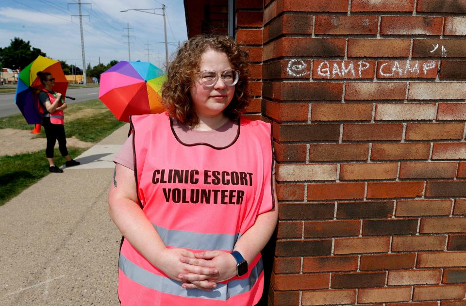 Charlotte, 28, of Grosse Pointe signed up online two weeks ago to be a volunteer for Gamp Camp Escorts and spent her first day helping out at the Eastland Women's Clinic in Eastpointe on July 2, 2022. Gamp Camp Escorts have seen a rise in volunteers signing up to help since the reversal of Roe vs Wade in late June.