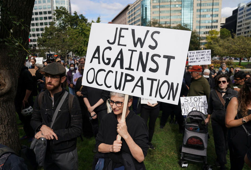 Activists calling for a cease-fire in Gaza protest near the White House