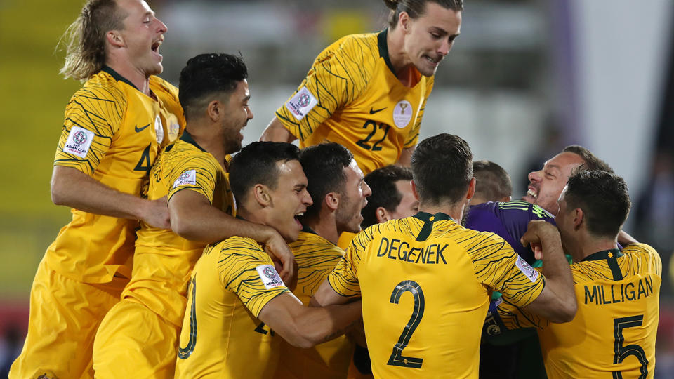 Mat Ryan celebrates with his teammates. (Photo by Francois Nel/Getty Images)