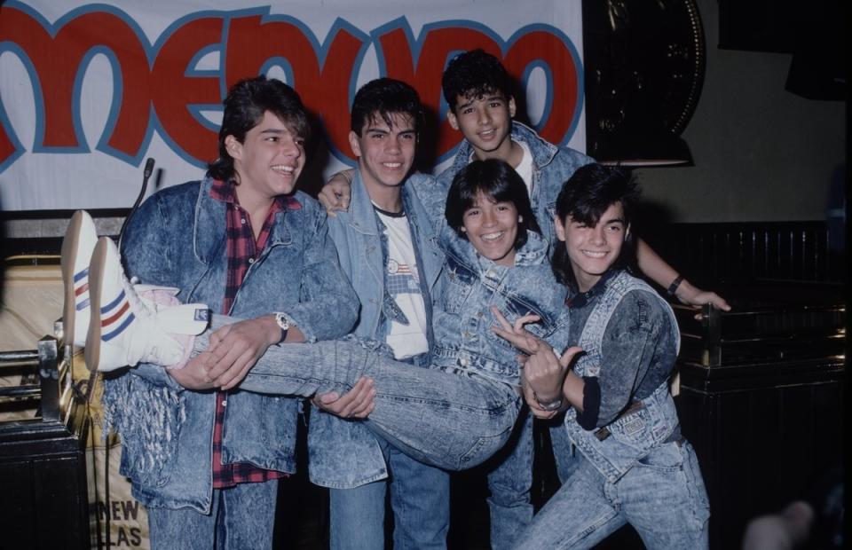 With Menudo in the late 80s, well coordinated with denim!