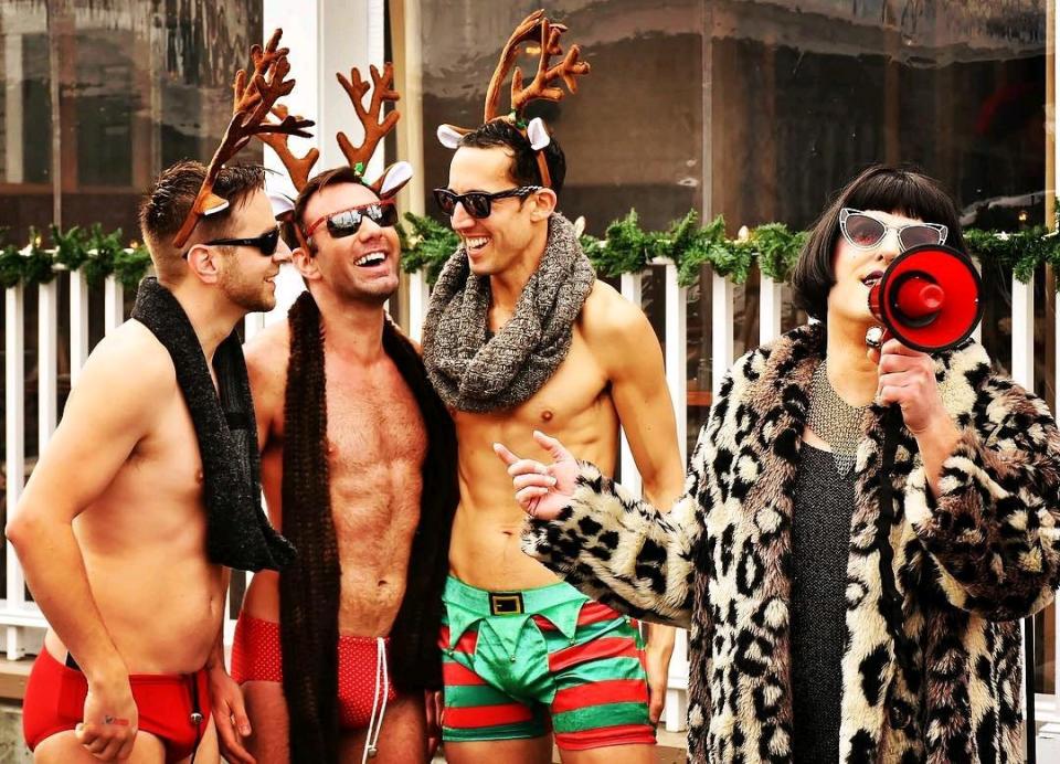 The Jingle Bell Run down Commercial Street in Provincetown often features Speedos and holiday costumes. [DAN MCKEON]