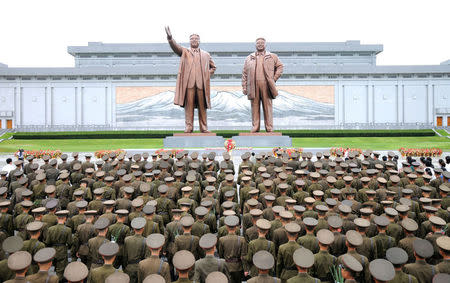 Servicepersons of the Korean People's Army (KPA) and the Korean People's Internal Security Forces (KPISF), civilians, school youth and children visited the statues of President Kim Il Sung and leader Kim Jong Il on the occasion of the 72nd anniversary of national liberation in this undated photo released by North Korea's Korean Central News Agency (KCNA) on August 15, 2017. KCNA/via REUTERS