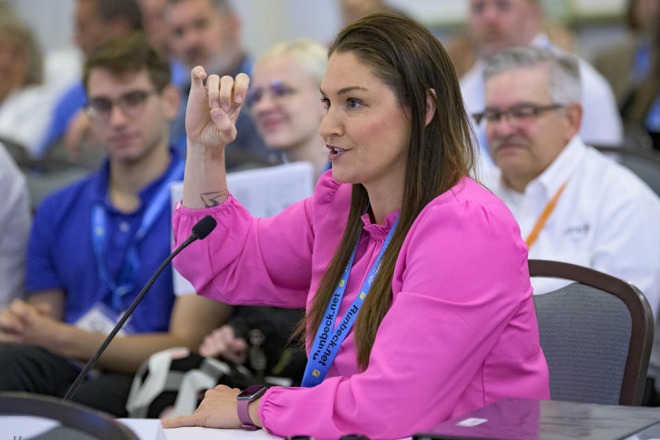 FILE - Oregon Secretary of State Shemia Fagan attends the summer conference of the National Association of Secretaries of State in Baton Rouge, La., July 8, 2022. Fagan apologized Monday, May 1, 2023, for taking a job as a $10,000-per-month consultant for a marijuana company, part of an industry that her office just audited, and said she exercised "poor judgment." (AP Photo/Matthew Hinton, File)