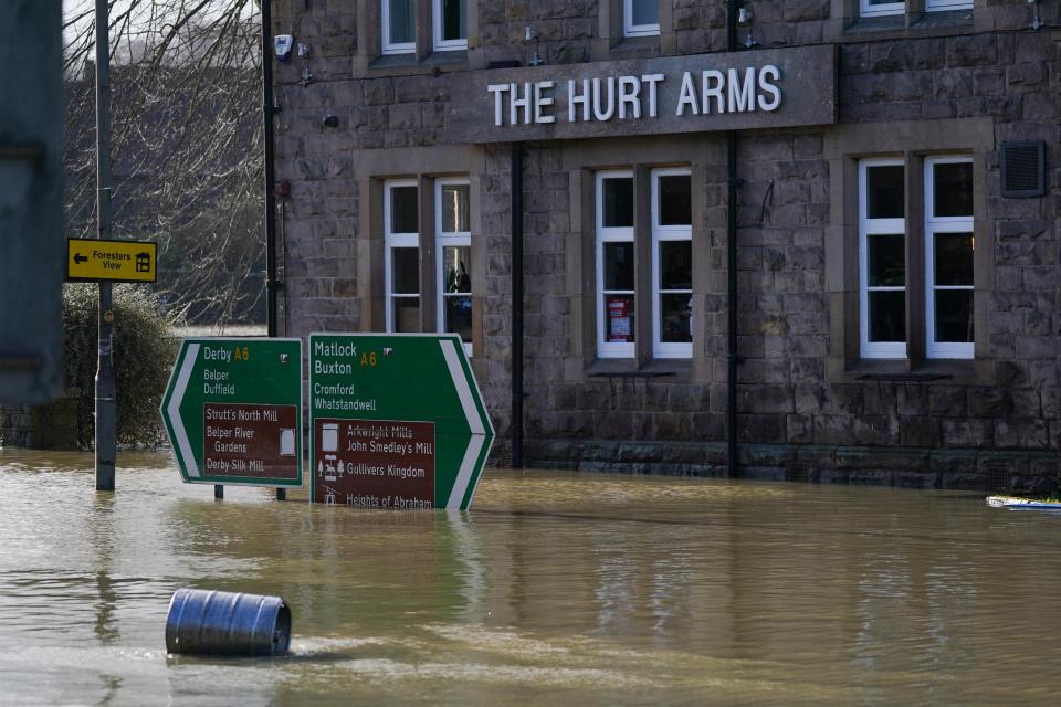 The Hurt Arms pub is surrounded by flood water in Belper, Derbyshire, as Britons have been warned to brace for strengthening winds and lashing rain as Storm Franklin moved in overnight, just days after Storm Eunice destroyed buildings and left 1.4 million homes without power. Picture date: Monday February 21, 2022.