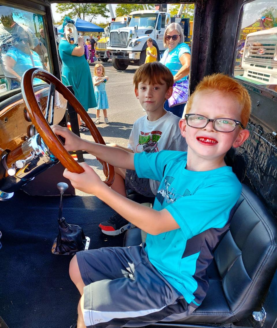 Youngsters enjoy trying out the trucks and other vehicles at the annual Falls Township Touch-a-Truck and Family Festival. This year's festival will take place Sept. 9 in Community Park.