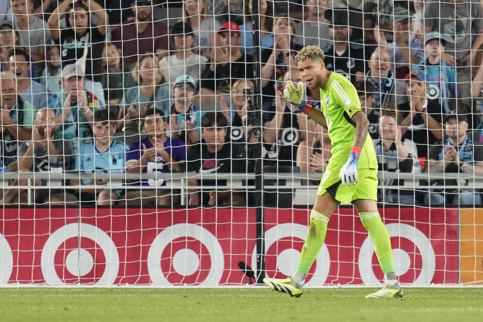 Minnesota United goalkeeper Dayne St. Clair celebrates after making a stop against the Colorado Rapids during the second half of an MLS soccer match Wednesday, Aug. 30, 2023, in St. Paul, Minn. (AP Photo/Abbie Parr)