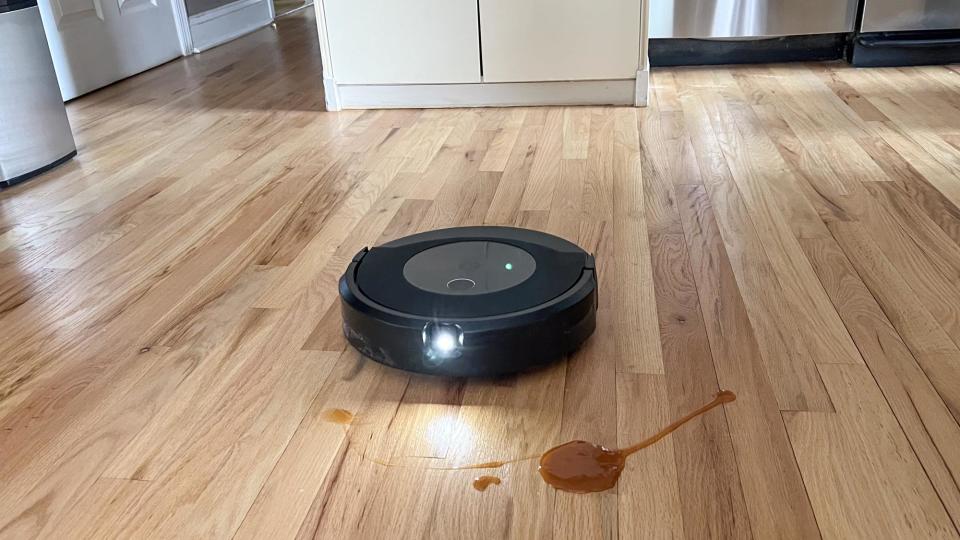 Roomba J9+ Combo robot vacuum and mop shown on floor