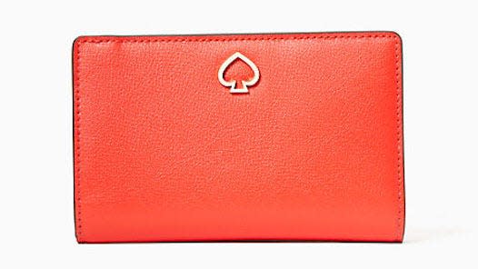 This stylish wallet will brighten her day.