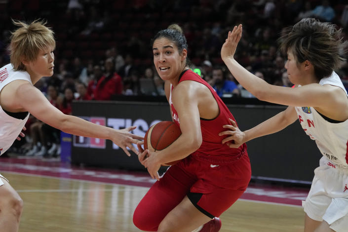 Canada's Kia Nurse attempts to get past the Japan defense during their game at the women's Basketball World Cup in Sydney, Australia, Sunday, Sept. 25, 2022. (AP Photo/Mark Baker)