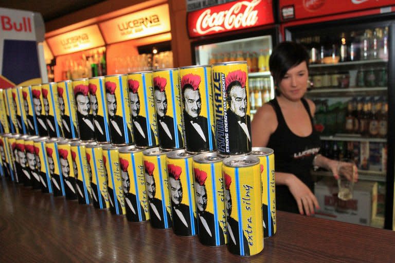 Energy drink cans with a punk-portrait of Czech Foreign Minister and defeated presidential candidate Karel Schwarzenberg are seen on January 26, 2013 in Prague