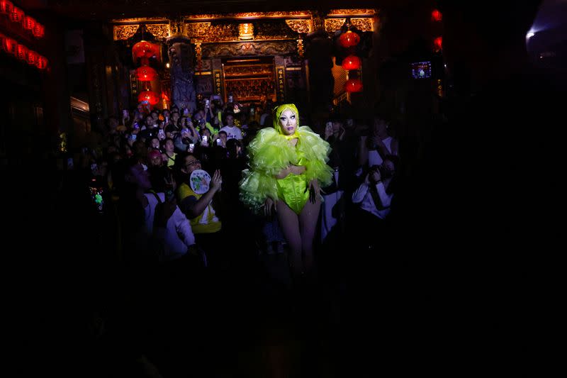 Nymphia Wind, a Taiwanese drag queen performs at a local temple ahead of the annual pride parade in Taipei